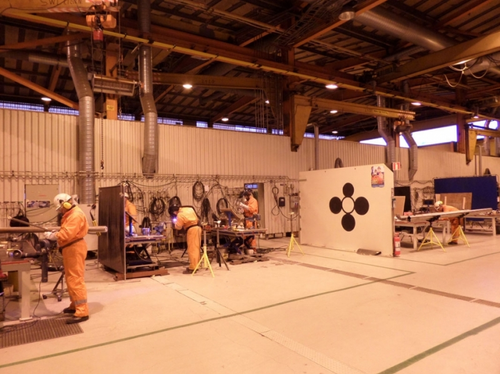 SEC Team of welders and pipe fitters working on the piping prefabrication facility at Kvaerner Stord